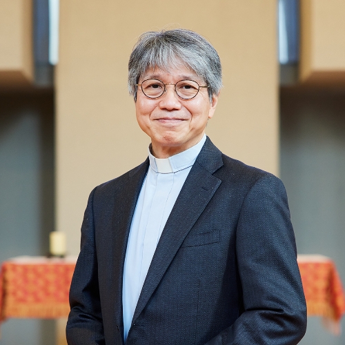 学長 石居基夫